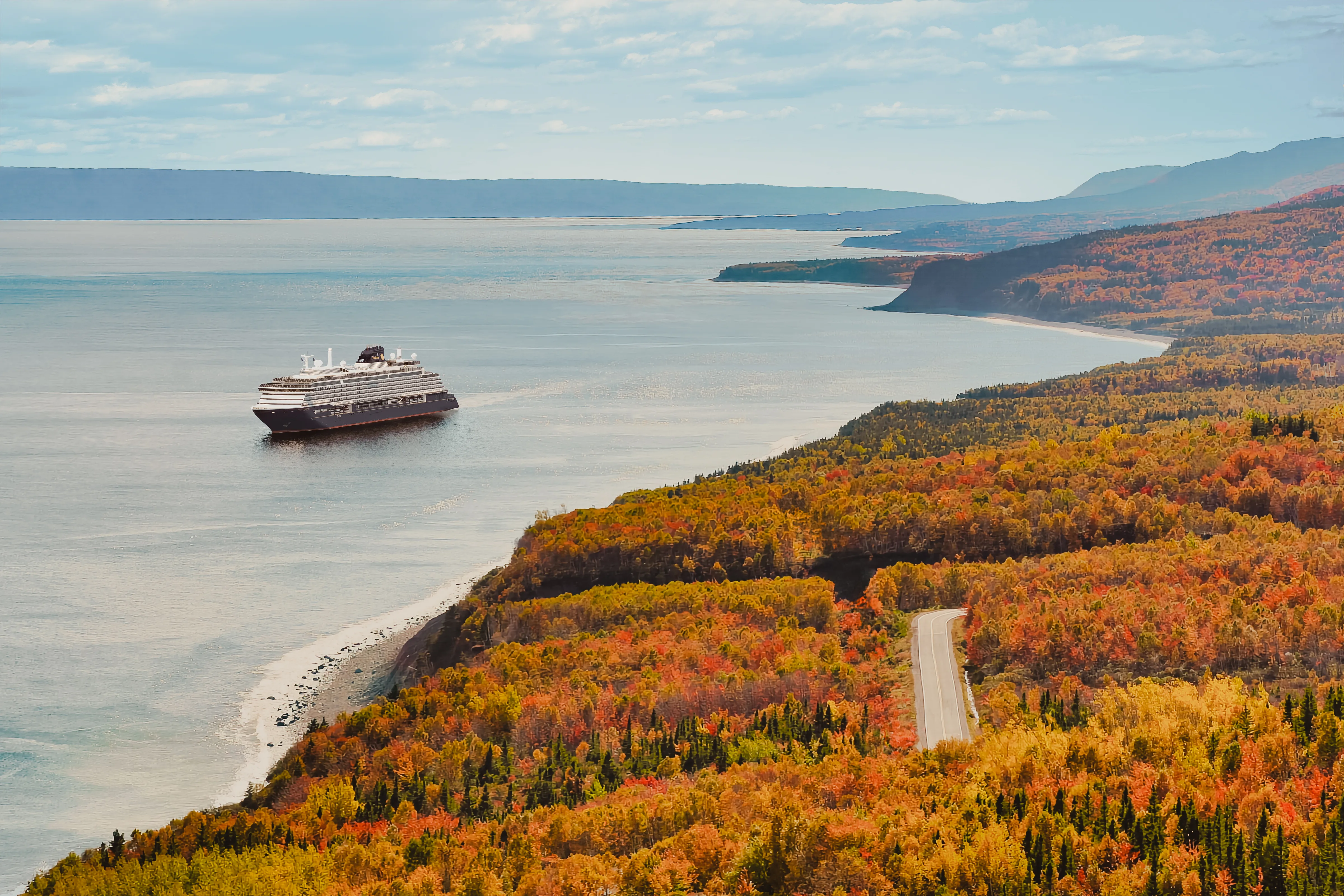 EXPLORA IV rendering sailing past Canadian fall foliage coastline